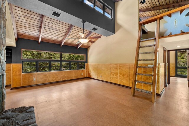 spare room with beamed ceiling, wooden ceiling, visible vents, and tile patterned floors