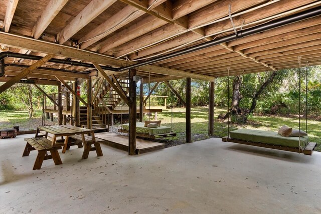 view of patio featuring stairway