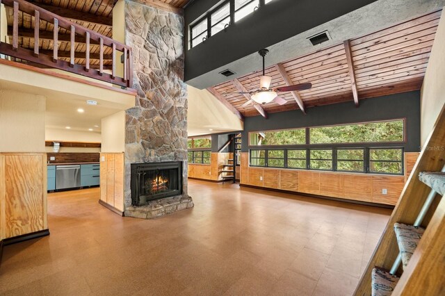 unfurnished living room with wood ceiling, visible vents, and beam ceiling