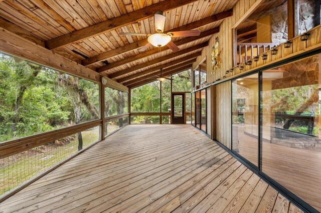 wooden deck featuring ceiling fan