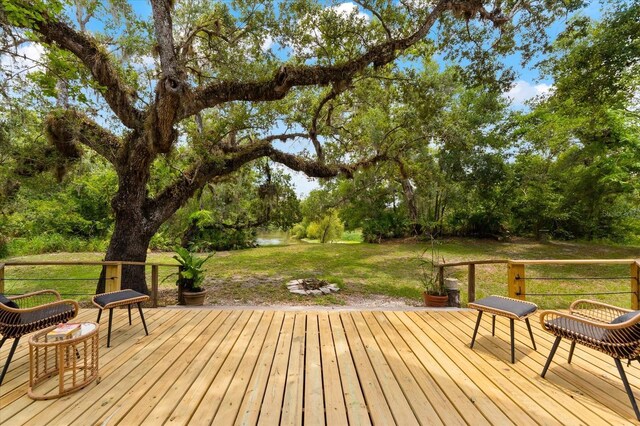 deck featuring a yard