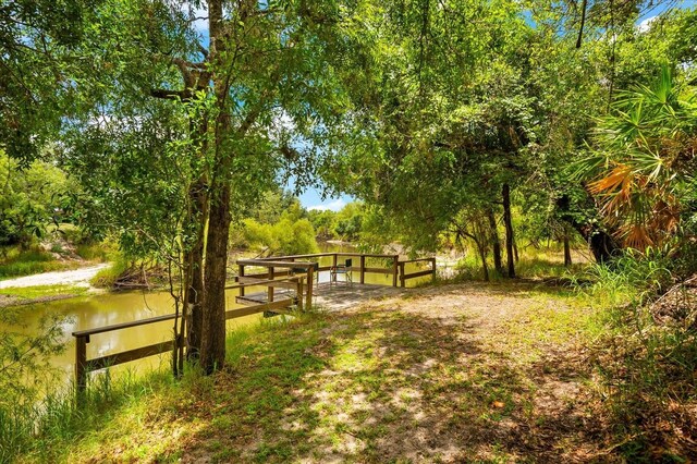 view of property's community with a water view