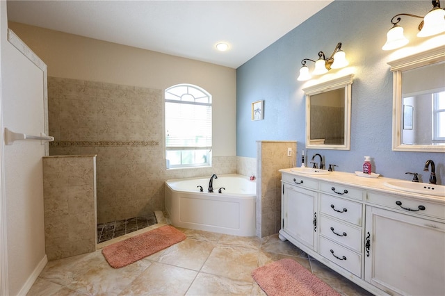 bathroom with vanity, tile patterned floors, and independent shower and bath