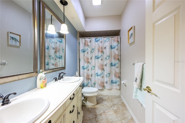 full bathroom with tile patterned flooring, vanity, toilet, and shower / bath combo with shower curtain