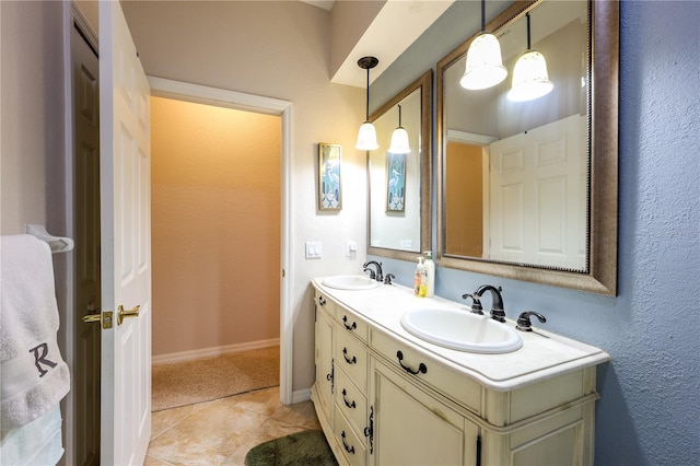 bathroom featuring tile patterned floors and vanity