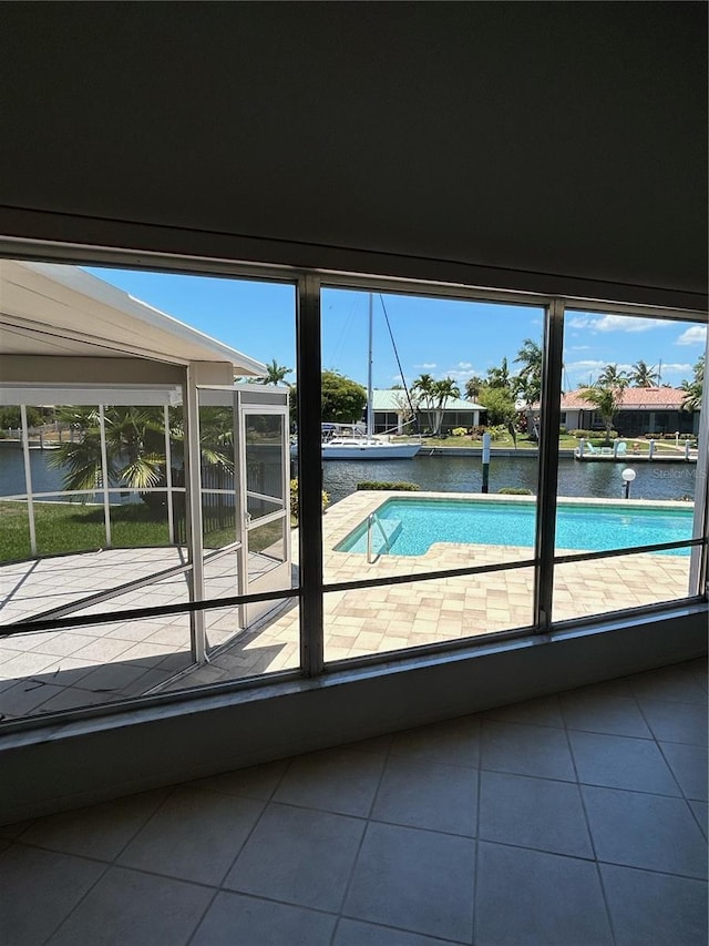 view of swimming pool with a water view