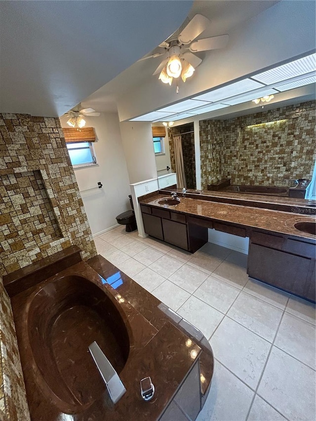 bathroom with vanity, tile patterned floors, and ceiling fan