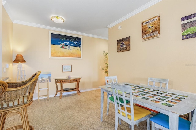 dining room featuring carpet and crown molding