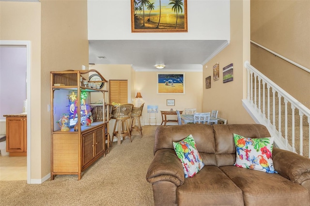 living room featuring light carpet and ornamental molding