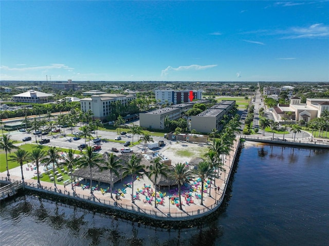 birds eye view of property with a water view