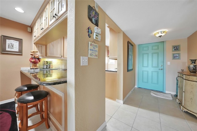 interior space with light tile patterned floors