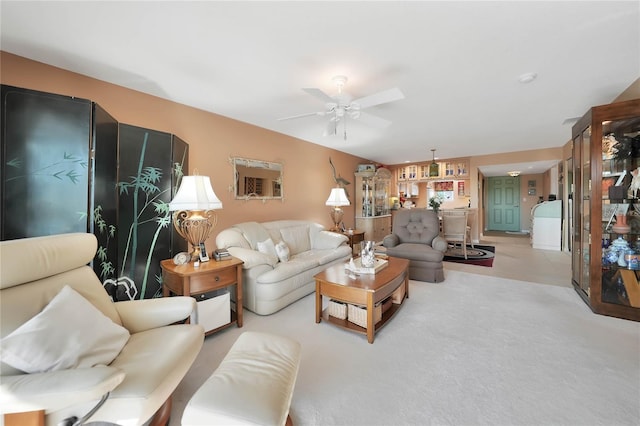 living room featuring ceiling fan