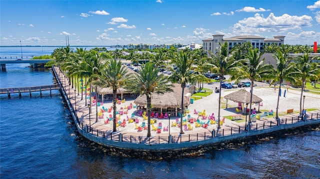 birds eye view of property with a water view