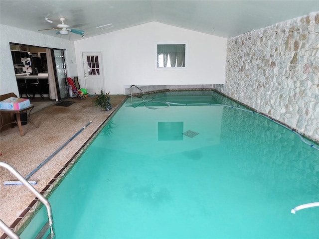 view of pool with ceiling fan