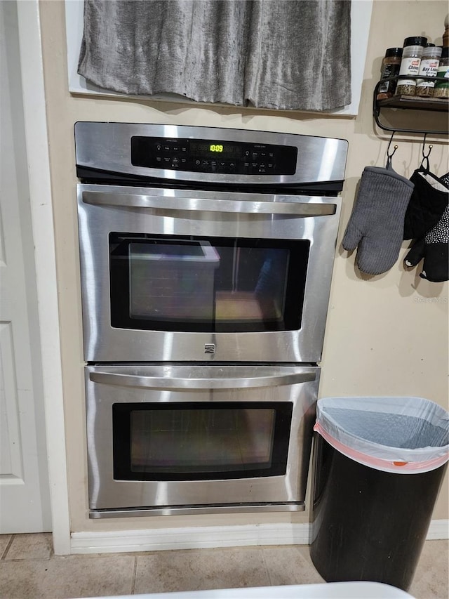 interior details with stainless steel double oven