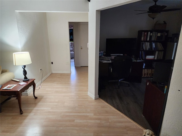 corridor featuring light wood-type flooring