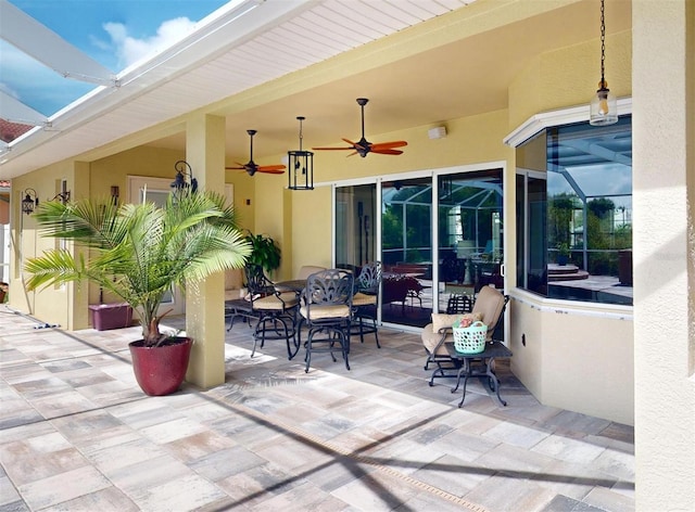 view of patio with ceiling fan