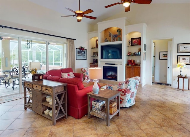 living room with high vaulted ceiling and ceiling fan