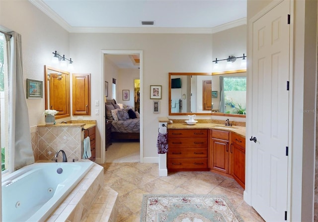 bathroom featuring vanity, a relaxing tiled tub, tile patterned floors, and ornamental molding