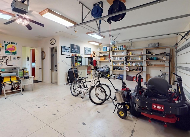 garage with ceiling fan and a garage door opener