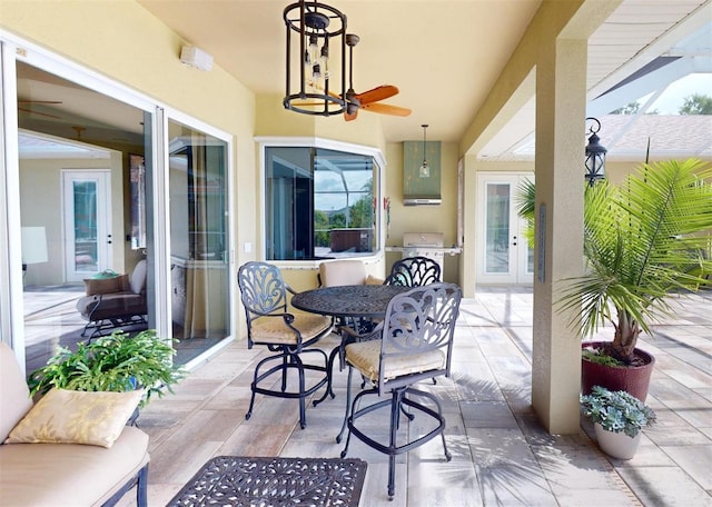 view of patio / terrace with area for grilling and ceiling fan