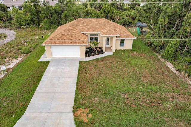820 Bowman Ter, Port Charlotte, FL 33953 - mediterranean / spanish-style house with a garage and a front yard