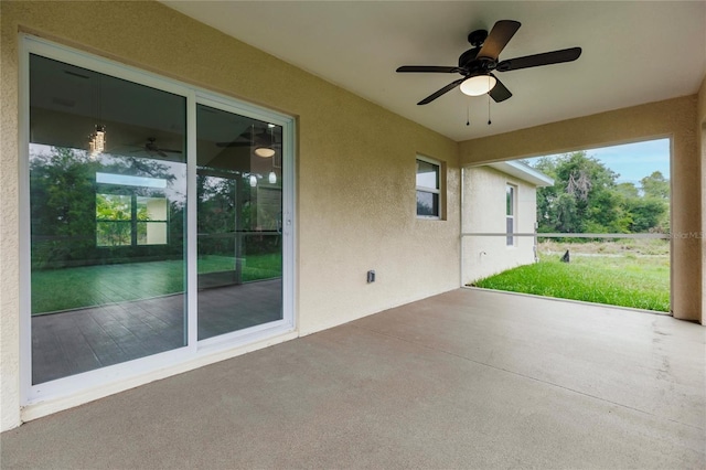 view of patio / terrace featuring ceiling fan