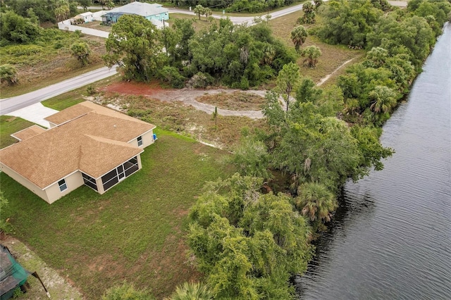 drone / aerial view featuring a water view