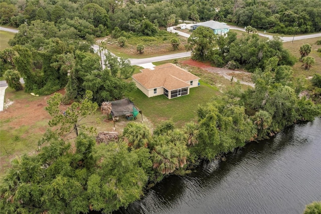 birds eye view of property featuring a water view