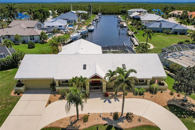 drone / aerial view featuring a water view