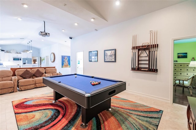 recreation room featuring light tile patterned flooring, pool table, and vaulted ceiling