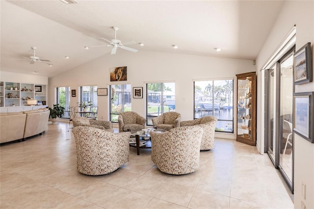 living room featuring ceiling fan, light tile patterned flooring, and high vaulted ceiling