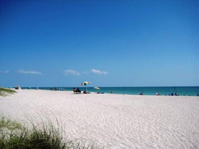 view of water feature with a beach view