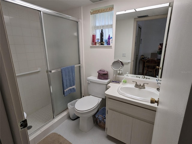 bathroom with an enclosed shower, oversized vanity, tile flooring, and toilet