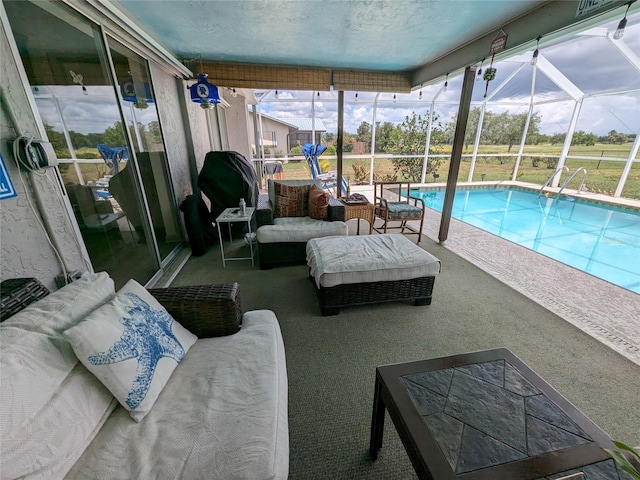 view of swimming pool with glass enclosure