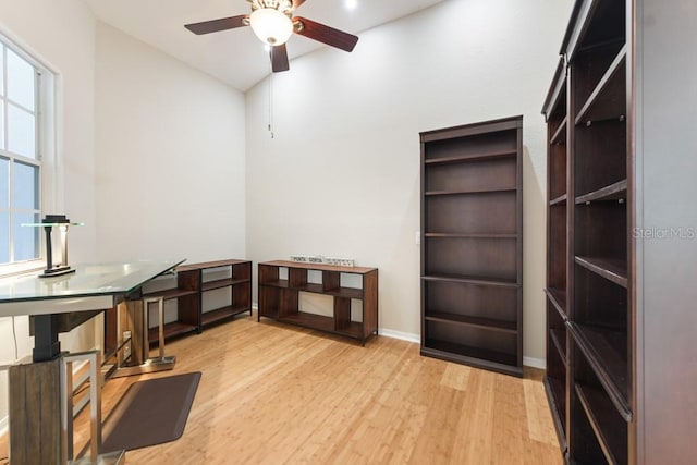 office with ceiling fan and light wood-type flooring