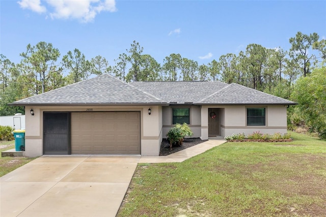 ranch-style home featuring a front yard and a garage