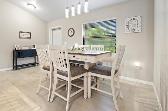 dining room featuring light tile patterned flooring