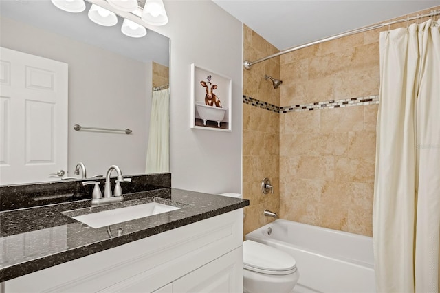 full bathroom with vanity, toilet, and shower / bath combo with shower curtain