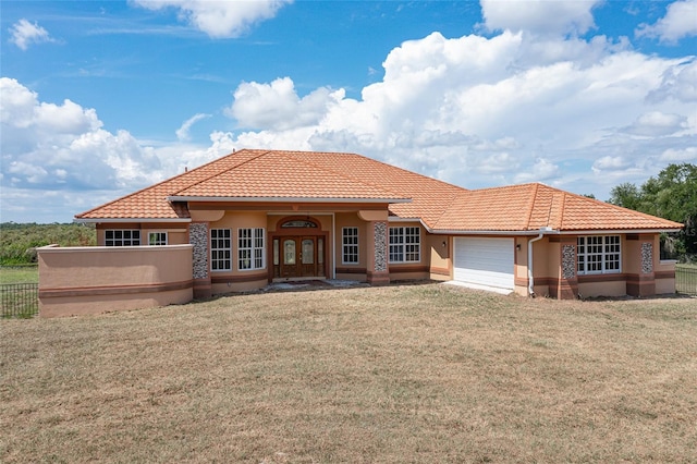 view of front of house featuring french doors and a garage