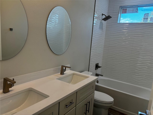 full bathroom with vanity, toilet, and bathtub / shower combination