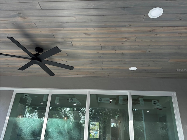 exterior details featuring ceiling fan