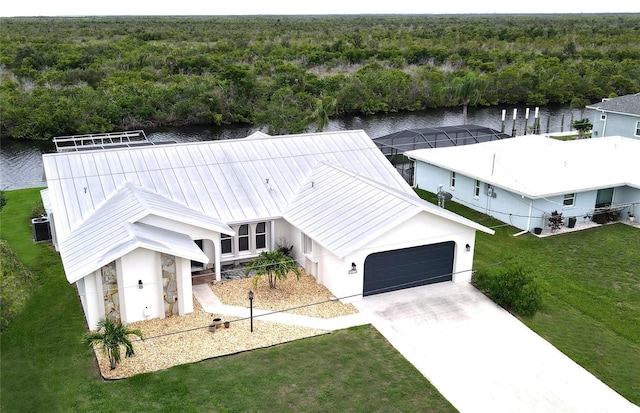 drone / aerial view featuring a water view