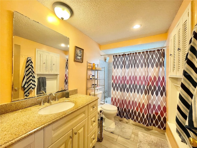 full bathroom featuring a textured ceiling, vanity, toilet, and shower / bath combo with shower curtain