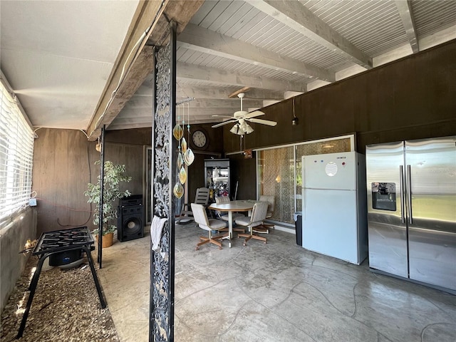 view of patio featuring ceiling fan