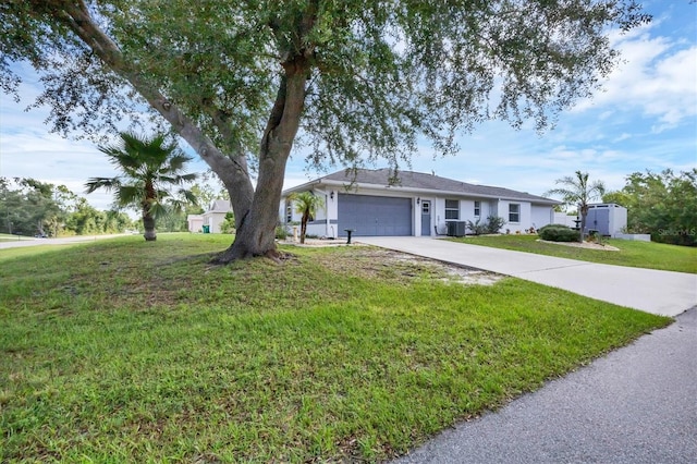 single story home featuring central AC unit, a garage, and a front lawn