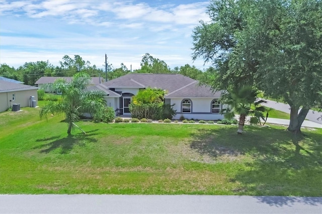 single story home with a front yard