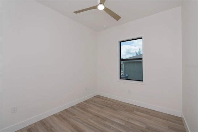 unfurnished room with ceiling fan and light wood-type flooring