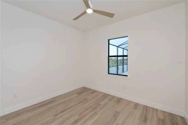 unfurnished room featuring light wood-type flooring and ceiling fan