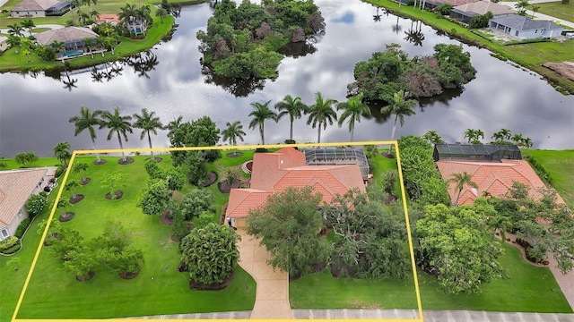 birds eye view of property featuring a water view